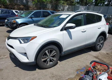 2018 Toyota Rav4 Xle из США, поврежденный, VIN 2T3RFREV3JW704835